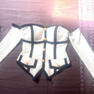 From the store HONEY this is a beautiful piece goes with slacks or skirts